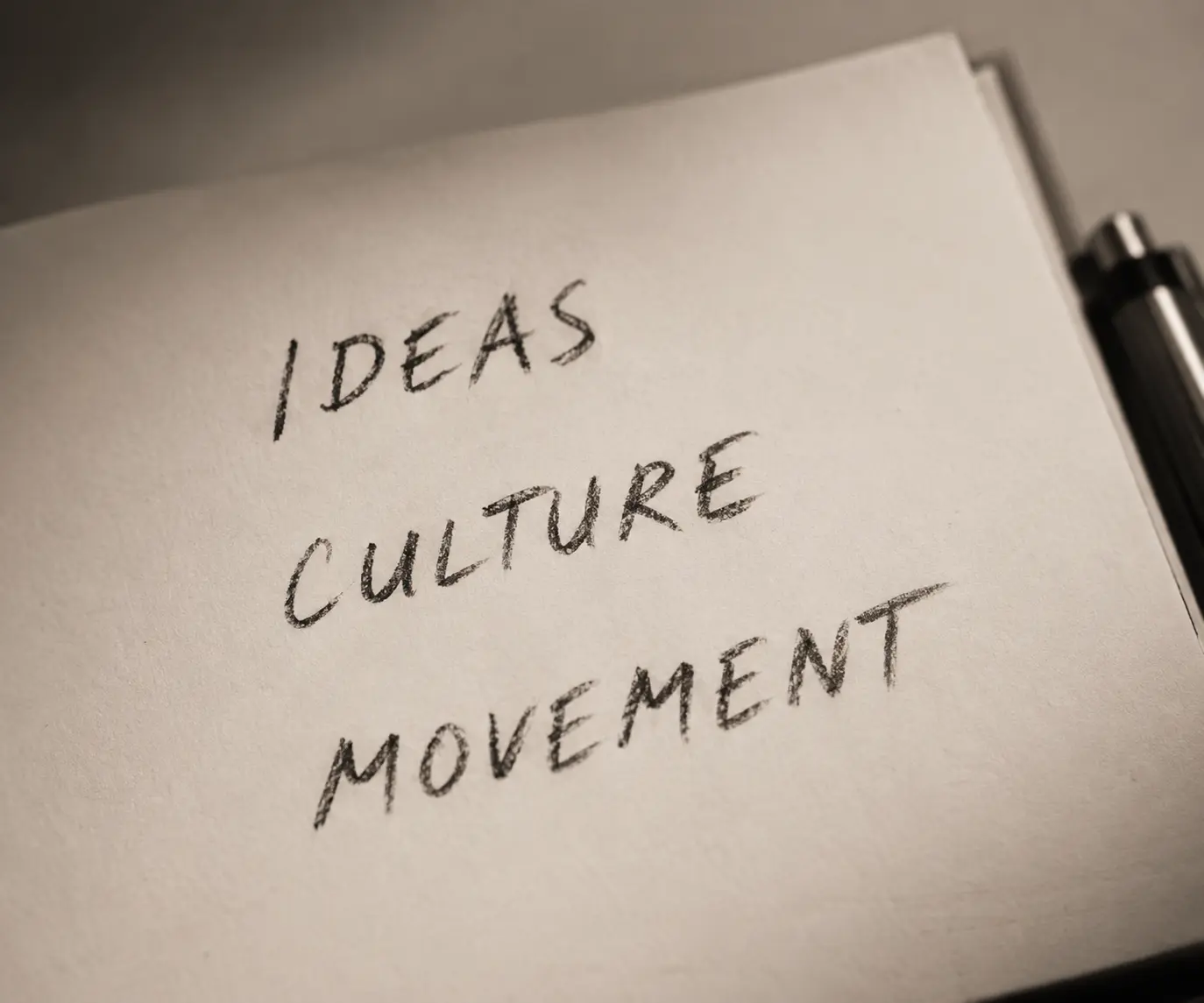 Notebook with Ideas, Culture and Movement written by hand